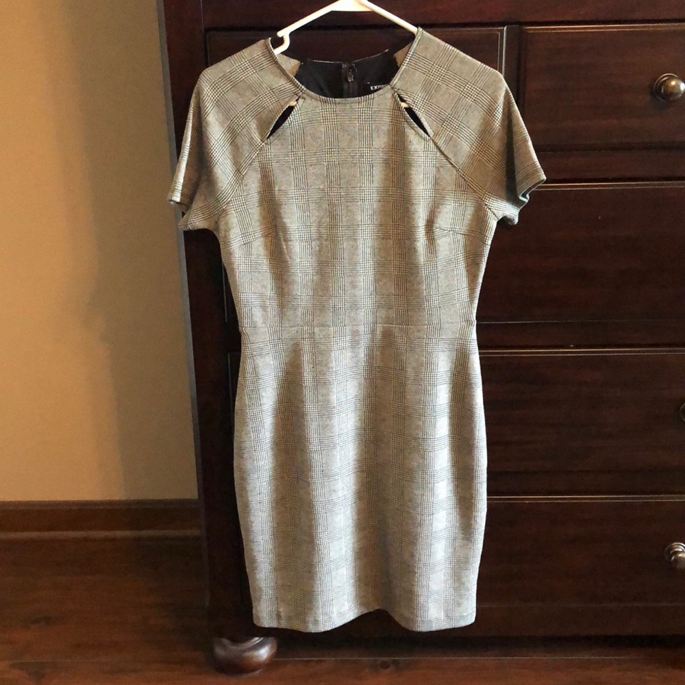 Express short sleeve dress with open detail.